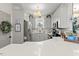 Bright kitchen with white cabinets, stainless steel appliances, decorative backsplash and quartz countertops at 817 Mossy Oak Dr, Fuquay Varina, NC 27526