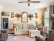 Bright living room with comfortable seating, stylish decor, and a cozy atmosphere enhanced by ample natural light at 817 Mossy Oak Dr, Fuquay Varina, NC 27526