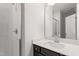 Modern bathroom featuring a tiled shower and vanity with a mirror at 84 Black Walnut Dr # 200, Garner, NC 27529