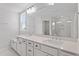 Bright bathroom vanity with double sinks and large mirror at 84 Black Walnut Dr # 200, Garner, NC 27529