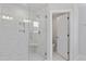 Modern bathroom features glass shower, and in-wall storage shelves at 84 Black Walnut Dr # 200, Garner, NC 27529