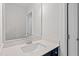 Bright bathroom featuring a vanity, large mirror, and modern fixtures at 84 Black Walnut Dr # 200, Garner, NC 27529