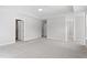 Large, well-lit carpeted bedroom with adjacent rooms at 84 Black Walnut Dr # 200, Garner, NC 27529