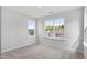 Bright bedroom featuring large windows with lovely neighborhood views at 84 Black Walnut Dr # 200, Garner, NC 27529