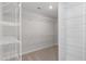Walk-in closet featuring white shelving and carpeting at 84 Black Walnut Dr # 200, Garner, NC 27529