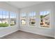 Bright sunroom featuring hardwood floors, large windows, and lots of natural light at 84 Black Walnut Dr # 200, Garner, NC 27529