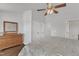 Spacious bedroom with ample closet space, wood floors, and neutral walls at 886 Cupola Dr, Raleigh, NC 27603