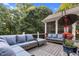 Comfortable outdoor seating on a large deck, perfect for enjoying serene backyard views at 10415 Ashmead Ln, Raleigh, NC 27614