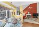 Dining area adjacent to living room with glass table and decorative chairs at 10415 Ashmead Ln, Raleigh, NC 27614