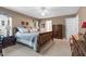 Large primary bedroom with sitting area and walk-in closet at 10415 Ashmead Ln, Raleigh, NC 27614