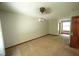 Neutral bedroom with light-colored carpet and light-colored walls at 116 Trinity Woods Dr, Raleigh, NC 27607