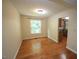 Dining room with hardwood floors and a view into the kitchen area at 116 Trinity Woods Dr, Raleigh, NC 27607