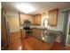 Well-equipped kitchen featuring stainless steel appliances and granite countertops at 116 Trinity Woods Dr, Raleigh, NC 27607