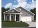 Charming single-Gathering home with a two-car garage, inviting front porch, and well-maintained lawn at 124 W Crescent Mills S Blvd # Homesite 250, Wilson's Mills, NC 27520