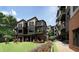 Apartment complex with outdoor lounge, green space, grilling area, and bicycle storage for convenient living at 130 Two Hills Dr # 104B, Carrboro, NC 27510