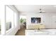 Bright living room featuring large windows, hardwood floors, modern furniture, and access to a balcony at 130 Two Hills Dr # 104B, Carrboro, NC 27510