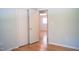 Bright bedroom with closet space and view into a connecting room at 1307 Sycamore Dr, Garner, NC 27529
