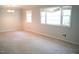 Spacious carpeted Dining Room with crown molding is naturally lit and waiting for your personal touches at 1307 Sycamore Dr, Garner, NC 27529