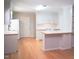 Modern kitchen with lots of cabinet space and an eat-in breakfast bar area at 1307 Sycamore Dr, Garner, NC 27529
