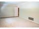 Spacious Living Room with classic crown molding provides a comfortable space to relax and unwind at 1307 Sycamore Dr, Garner, NC 27529