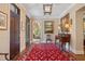 Sophisticated foyer featuring hardwood floors, stylish decor, and ample natural light at 1312 Duplin Rd, Raleigh, NC 27607