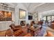 Cozy living room features a fireplace, wood floors, and stylish decor at 1312 Duplin Rd, Raleigh, NC 27607