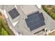 A close up aerial view of a roof with solar panels at 1312 Duplin Rd, Raleigh, NC 27607