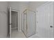 This bathroom features a glass-enclosed shower and neutral walls at 1408 Bridgeport Dr, Raleigh, NC 27615