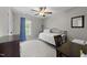 Cozy bedroom features a daybed, ceiling fan, and natural light from the window at 1408 Bridgeport Dr, Raleigh, NC 27615