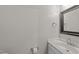 Clean powder room with modern fixtures, vanity, and framed mirror at 1408 Bridgeport Dr, Raleigh, NC 27615