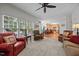 Spacious living room with large windows providing ample natural light and views of outdoors at 1412 Kings Lassiter Way, Raleigh, NC 27614