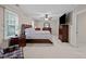 Spacious main bedroom with ceiling fan, carpet floors and a double dresser with mirror at 1412 Kings Lassiter Way, Raleigh, NC 27614