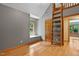 This bedroom features a unique ladder leading to an upper level, complemented by natural light from a window at 145 Ryan Rd, Pittsboro, NC 27312