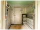 Interior with refrigeration unit and metal shelves at 145 Ryan Rd, Pittsboro, NC 27312