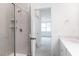Bathroom featuring tiled shower with glass door, and white vanity at 173 Little Creek Dr, Lillington, NC 27546