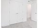Bedroom featuring a large closet with bi-fold doors, and neutral carpet at 173 Little Creek Dr, Lillington, NC 27546