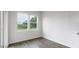 Bright dining area with wood look floors and a view of the trees at 190 Babbling Creek Dr, Youngsville, NC 27596