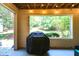 Outdoor patio area offering a view to the backyard at 1911 Falls Landing Dr # 103, Raleigh, NC 27614