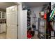 Spacious storage room with water heater, shelving, and access to the kitchen at 1911 Falls Landing Dr # 103, Raleigh, NC 27614