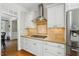 Modern kitchen featuring stainless steel appliances, granite countertops, and recessed lighting at 2328 Forestbluff Dr, Fuquay Varina, NC 27526