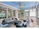 A large screened porch with tile floor offers space for seating and entertaining at 2328 Forestbluff Dr, Fuquay Varina, NC 27526