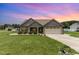 Charming single-Gathering home with well-manicured lawn, two-car garage, and inviting curb appeal at 235 Camden Place St, Princeton, NC 27569