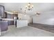 Modern kitchen with stainless steel appliances, granite countertops, and bar seating at 235 Camden Place St, Princeton, NC 27569