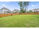 Spacious backyard with lawn and privacy fence at 2527 Sidewinder Ct, Apex, NC 27523