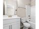 Clean bathroom featuring a vanity, a large mirror, and a shower tub at 2527 Sidewinder Ct, Apex, NC 27523