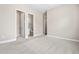 A simple bedroom with neutral walls and carpeted floors at 2527 Sidewinder Ct, Apex, NC 27523