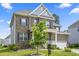 Charming brick home with well-maintained landscaping and attached two-car garage at 2527 Sidewinder Ct, Apex, NC 27523