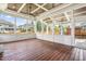 Spacious screened porch with a wood ceiling and a view of the backyard at 2527 Sidewinder Ct, Apex, NC 27523