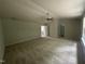 Spacious main bedroom with carpet flooring and a view of the ensuite bathroom at 2852 Orchard Trace Way, Raleigh, NC 27610