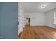 Inviting living room with hardwood floors, built-in bookshelves, and fresh paint throughout at 303 N Watauga Ave, Dunn, NC 28334